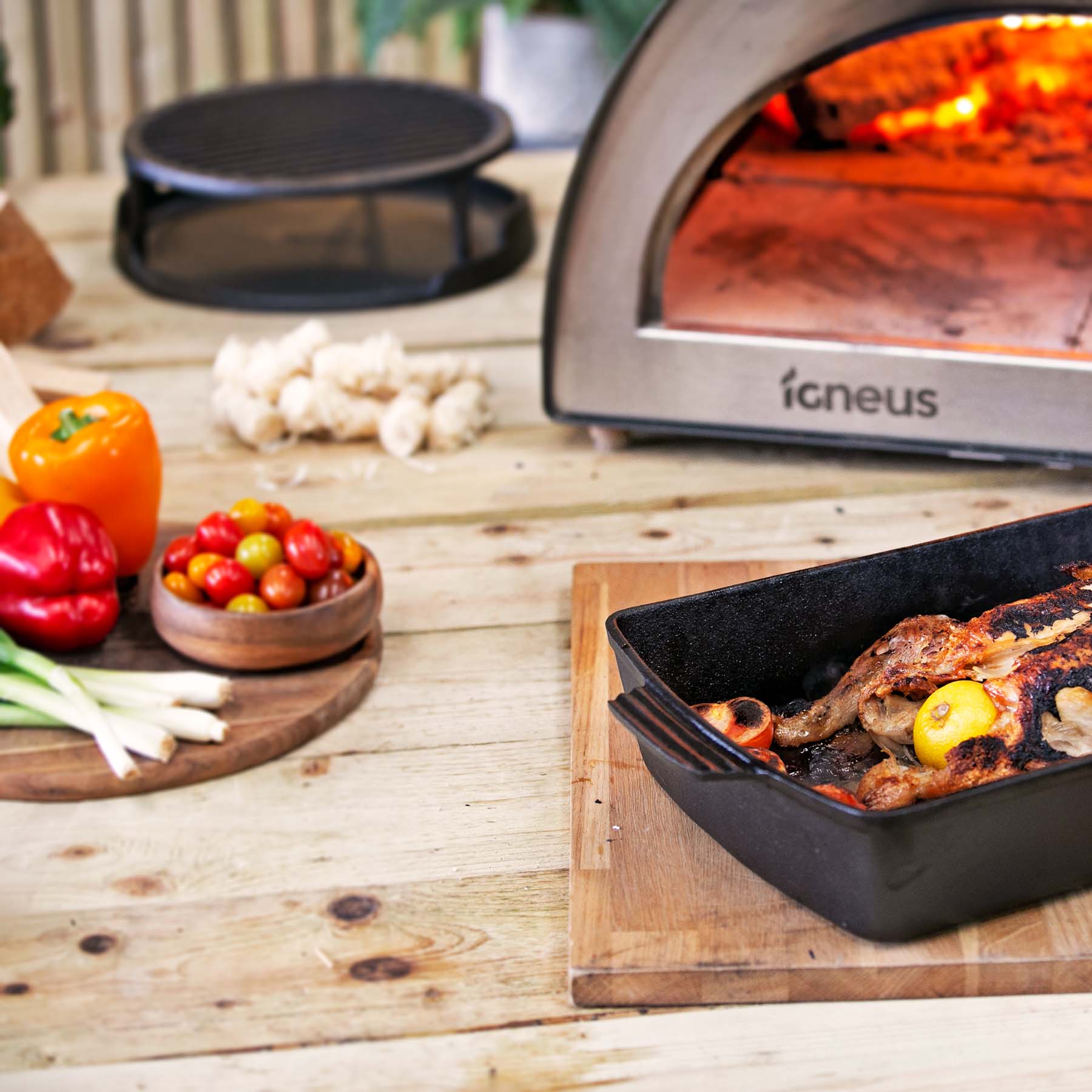 https://www.igneuswoodfiredovens.com/wp-content/uploads/2023/03/Igneus-Cast-Iron-Roasting-Pan-Igneus-wood-fired-pizza-ovens-pizza-oven-accessories-roast-chicken-.jpg